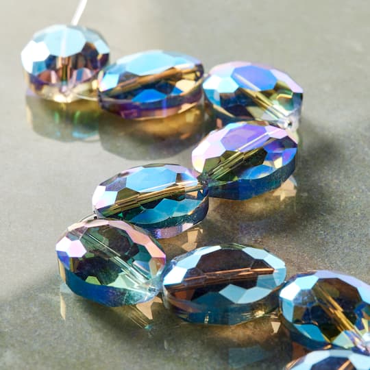 12 Packs: 9 ct. (108 total) Blue Glass Faceted Oval Beads, 20mm by Bead Landing™